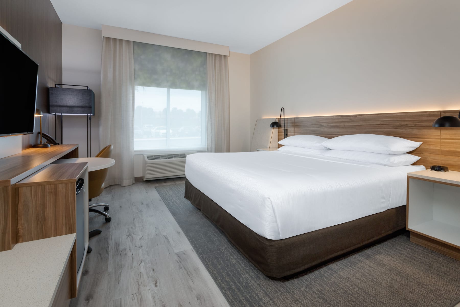 Guest room at the Wyndham Garden Orlando Airport in Orlando, Florida