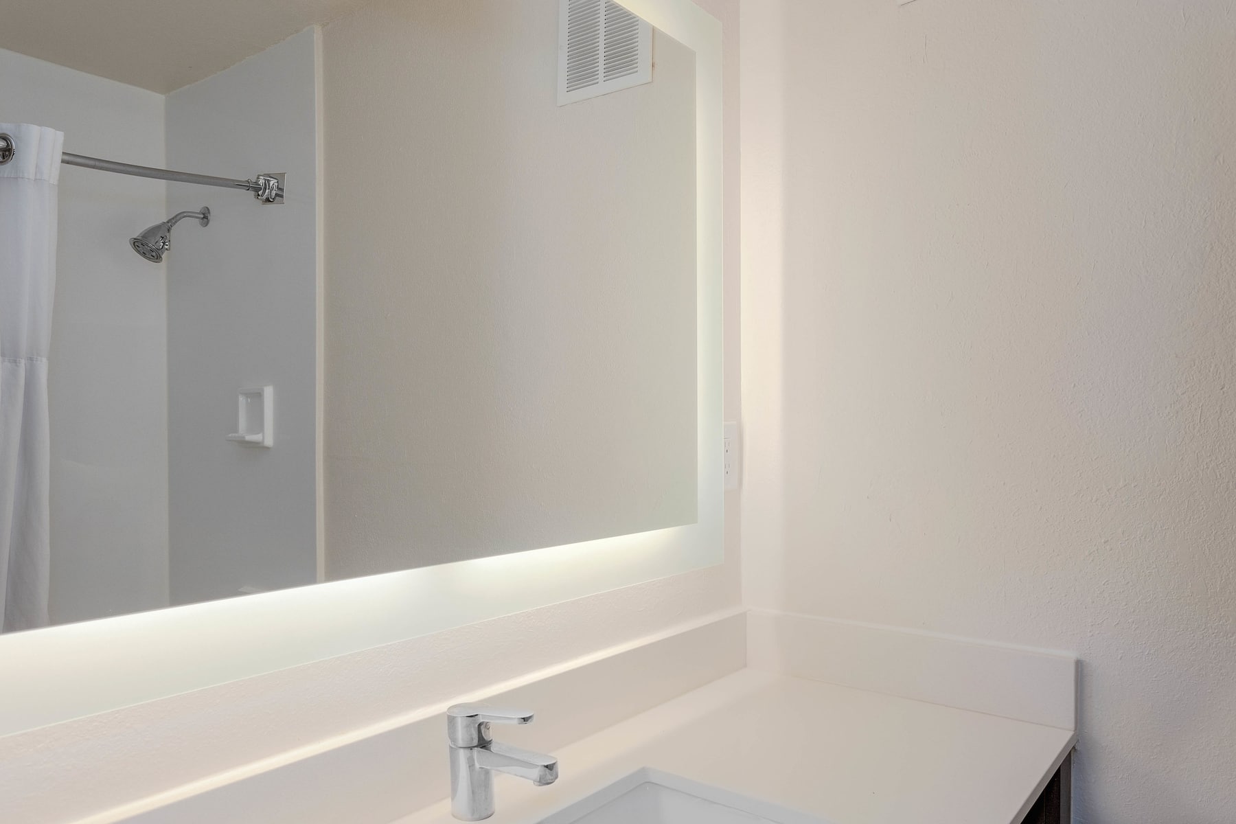 Guest room bath at the Wyndham Garden Tallahassee Capitol in Tallahassee, Florida