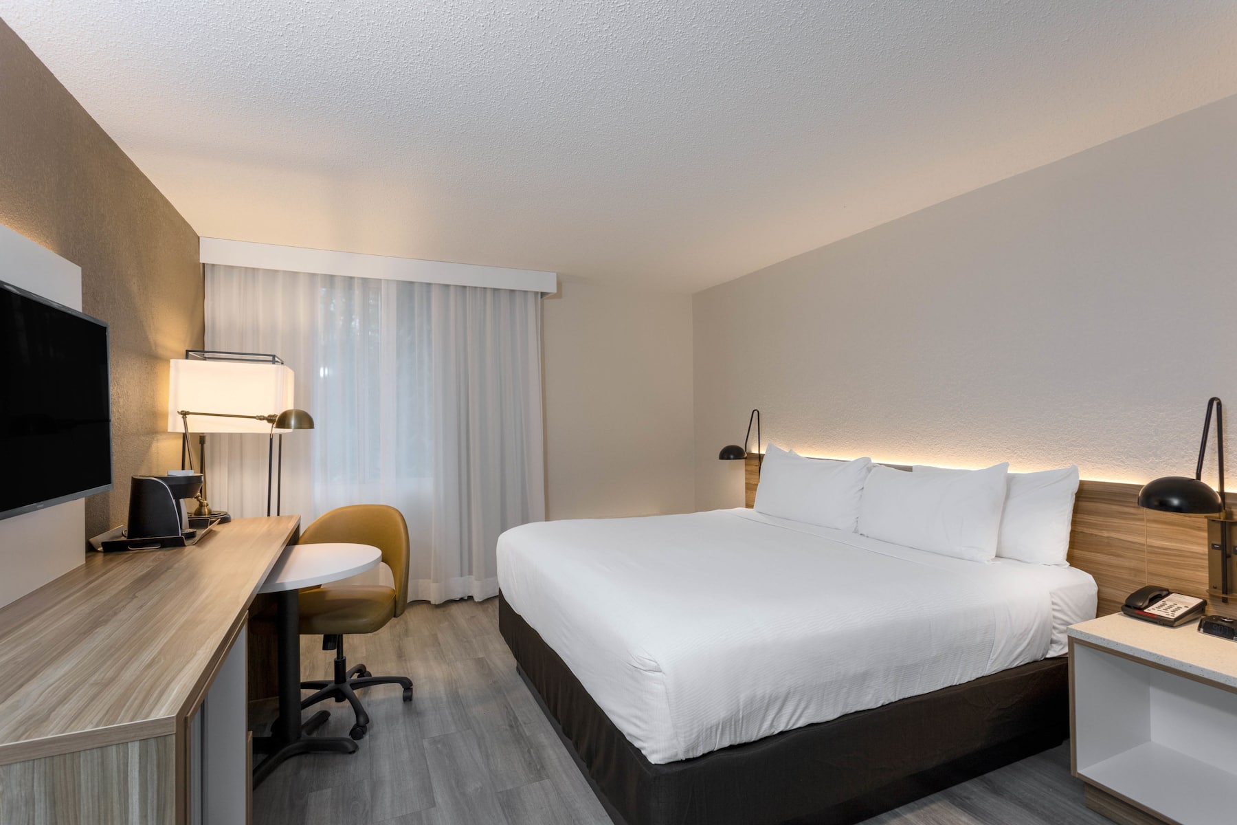 Guest room at the Wyndham Garden Tallahassee Capitol in Tallahassee, Florida