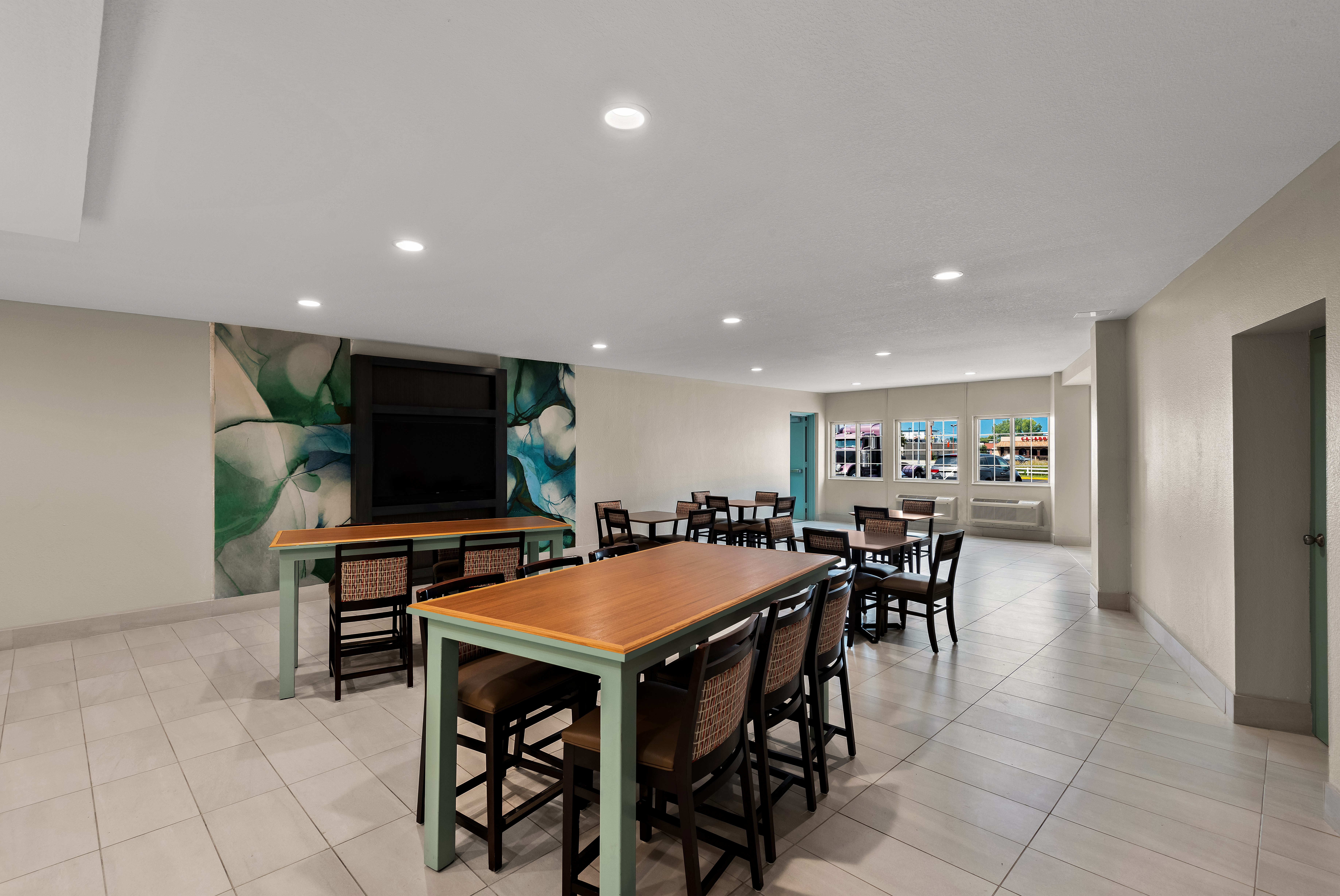 Wyndham Garden Ankeny restaurant breakfast area with seating in Ankeny, Iowa