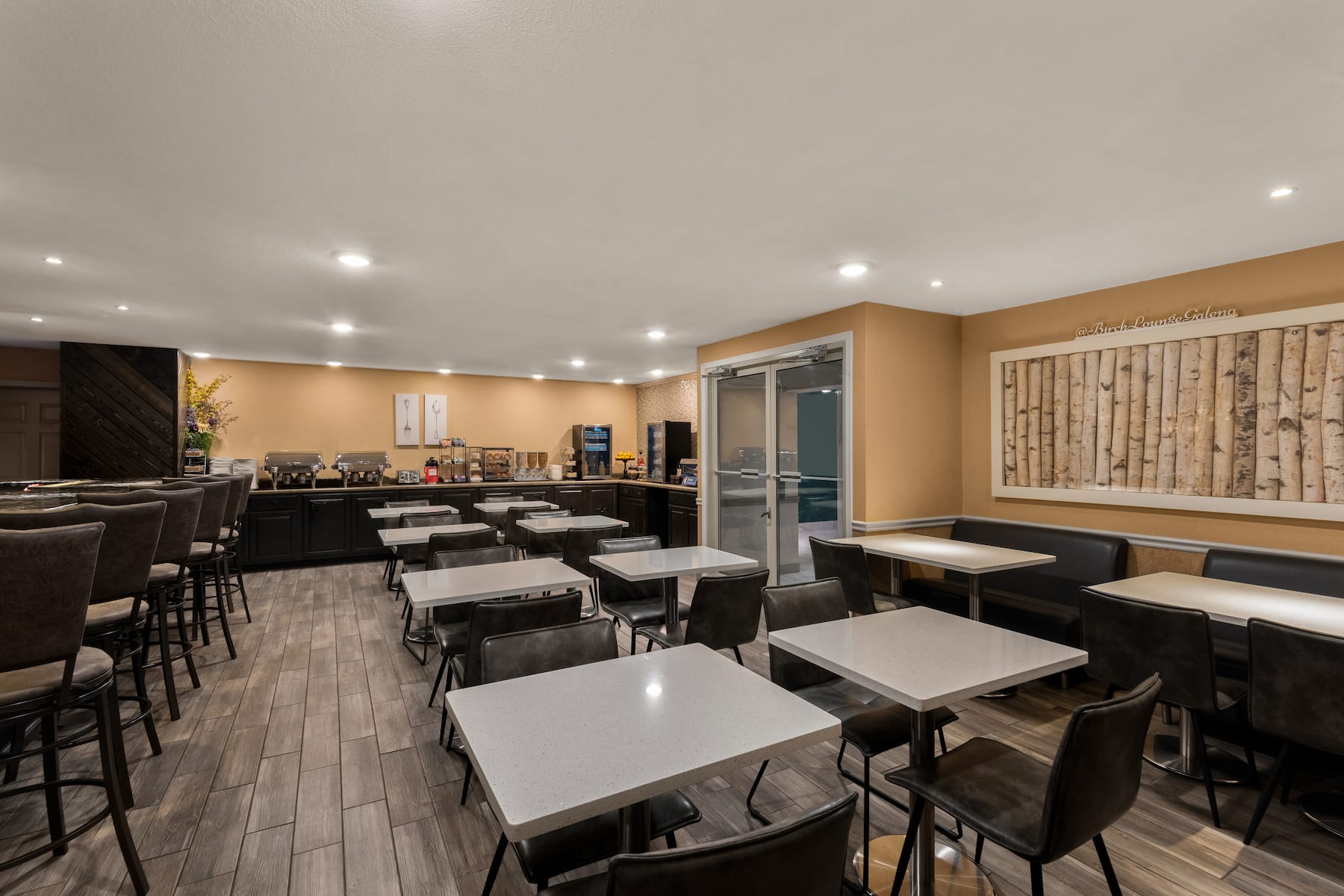 Wyndham Garden Galena Hotel & Day Spa restaurant breakfast area with seating in Galena, Illinois
