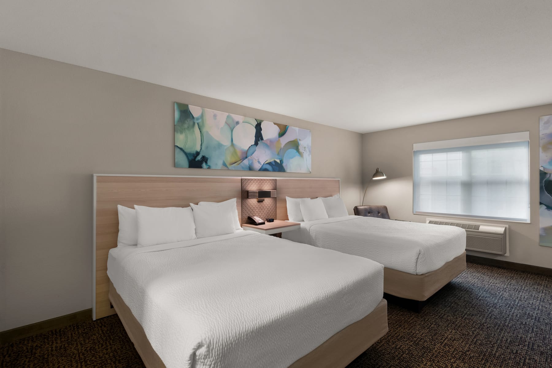 Guest room at the Wyndham Garden Galena Hotel & Day Spa in Galena, Illinois