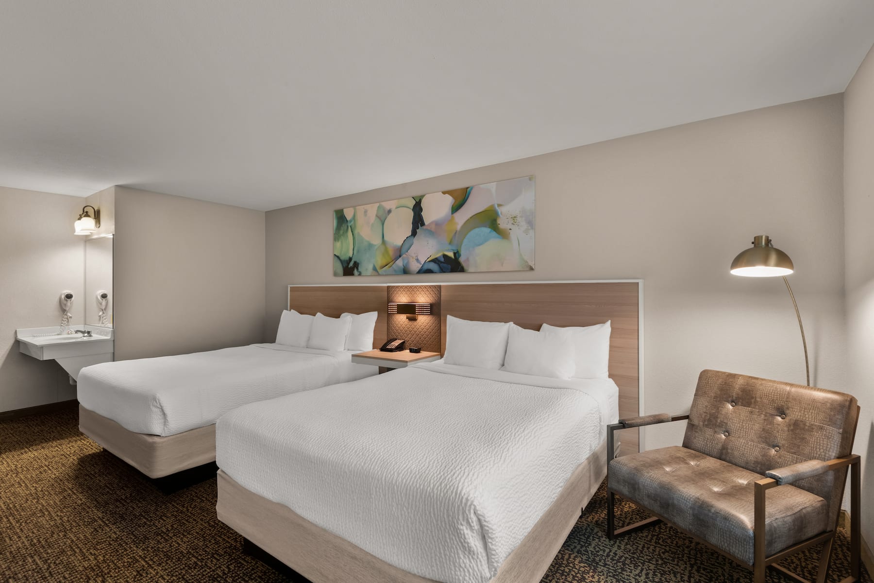 Guest room at the Wyndham Garden Galena Hotel & Day Spa in Galena, Illinois