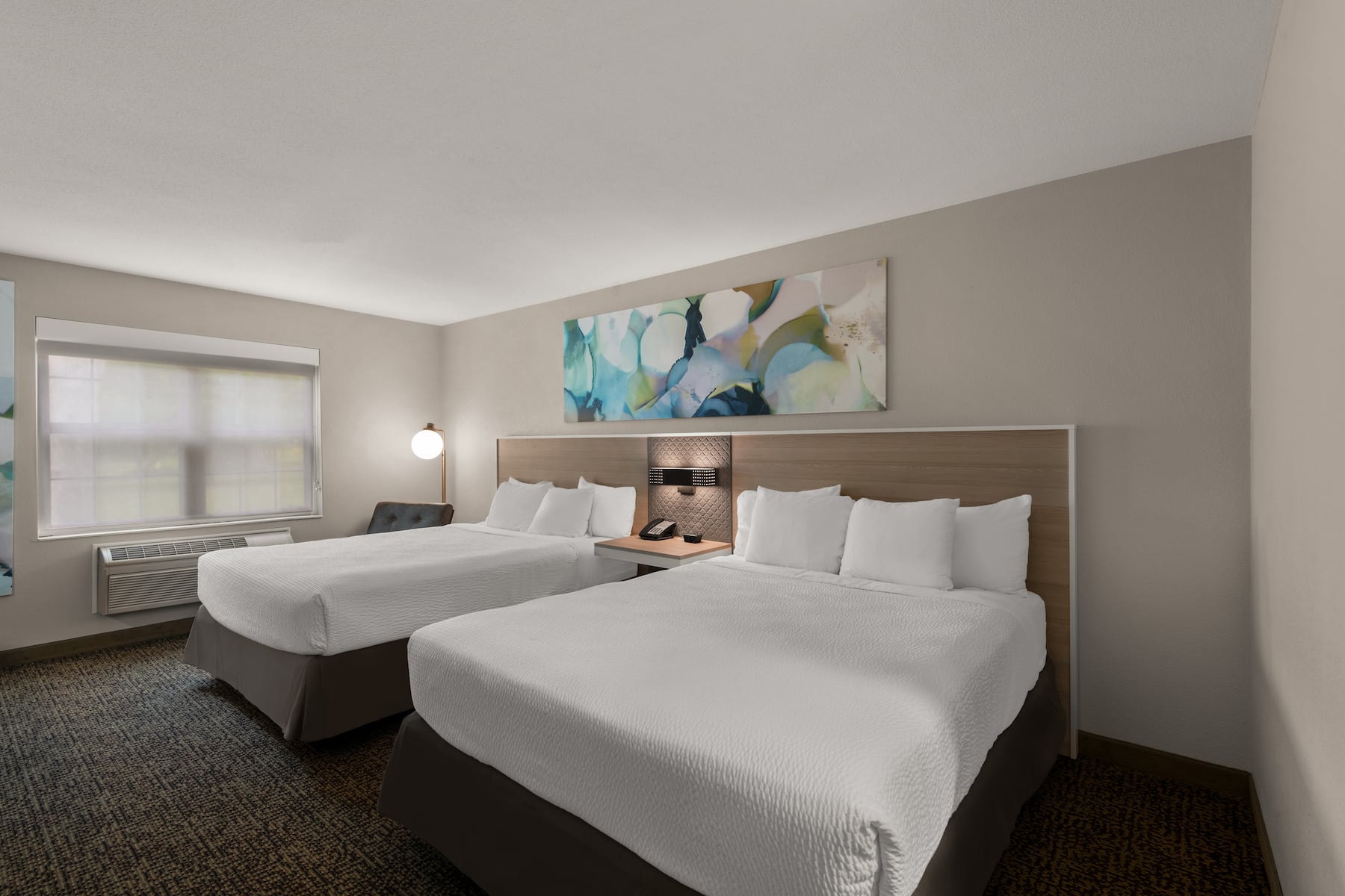 Guest room at the Wyndham Garden Galena Hotel & Day Spa in Galena, Illinois