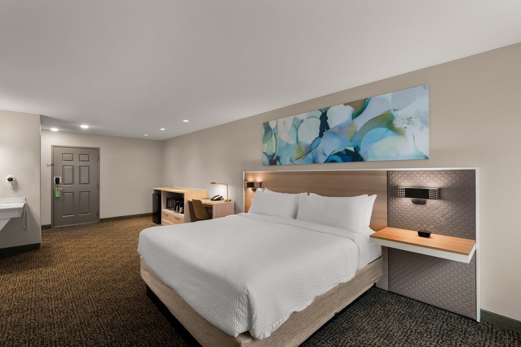 Guest room at the Wyndham Garden Galena Hotel & Day Spa in Galena, Illinois