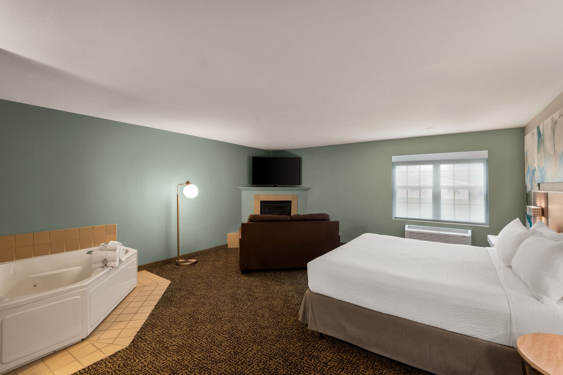 Guest room at the Wyndham Garden Galena Hotel & Day Spa in Galena, Illinois