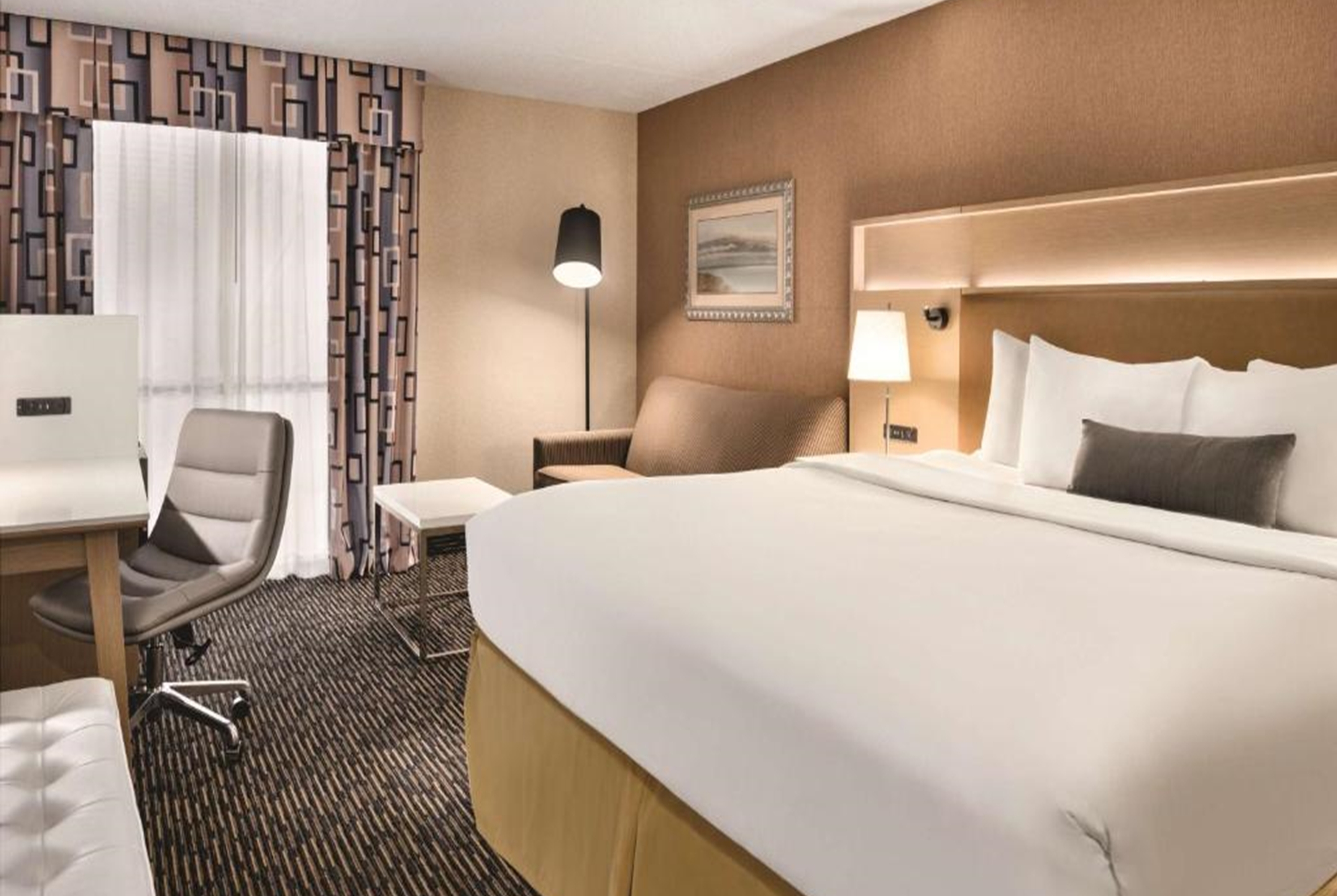 Guest room at the Wyndham Garden Conference Center Champaign/Urbana in Urbana, Illinois