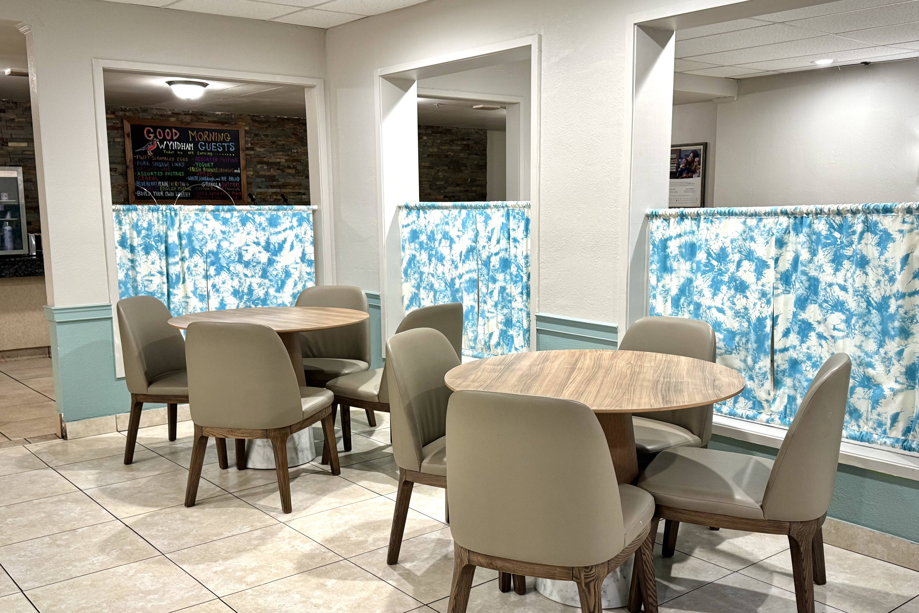 Wyndham Garden Ann Arbor restaurant breakfast area with seating in Ann Arbor, Michigan