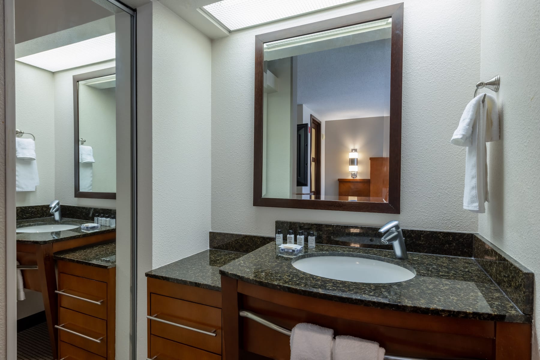 Guest room bath at the Wyndham Garden Kansas City Airport in Kansas City, Missouri