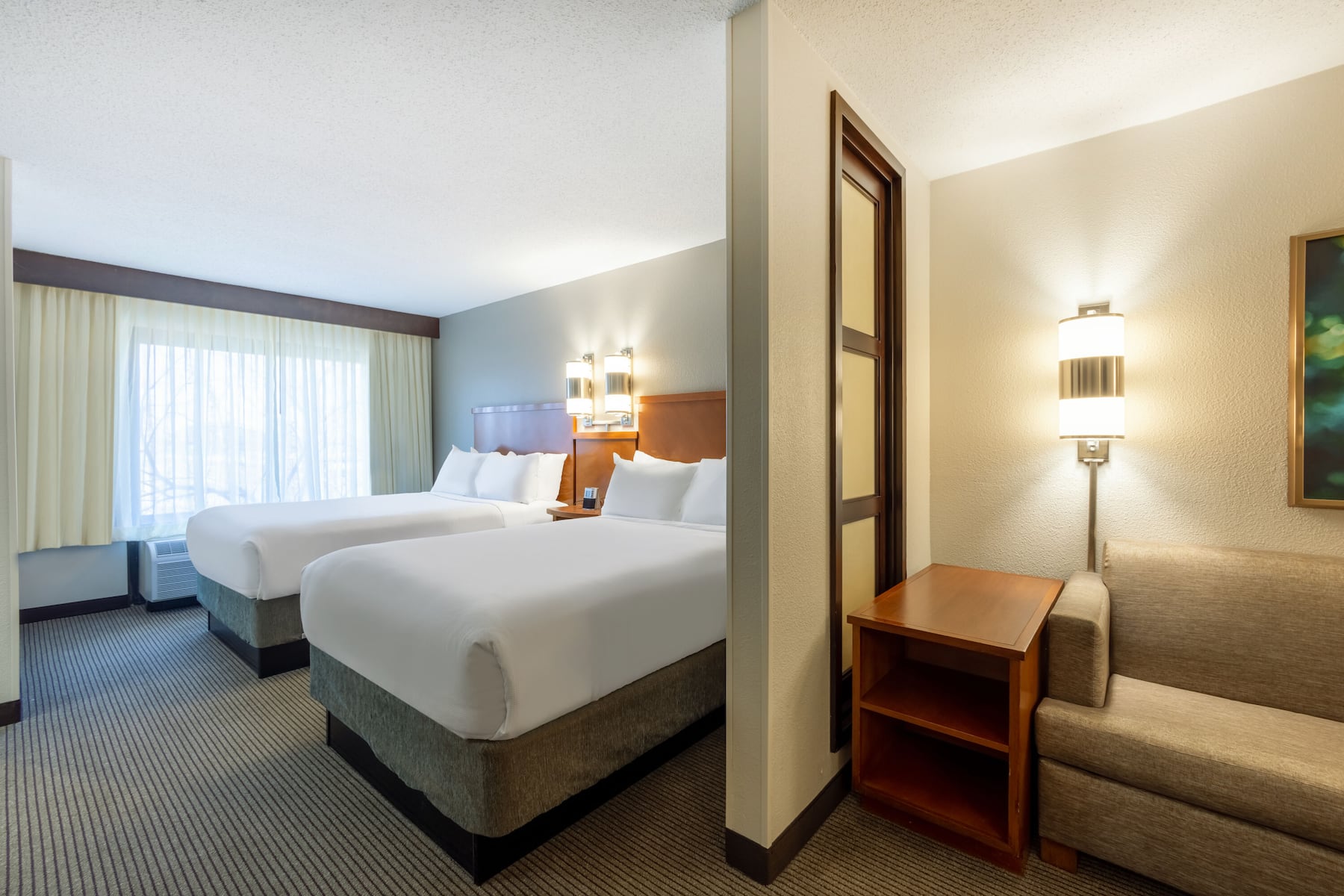 Guest room at the Wyndham Garden Kansas City Airport in Kansas City, Missouri