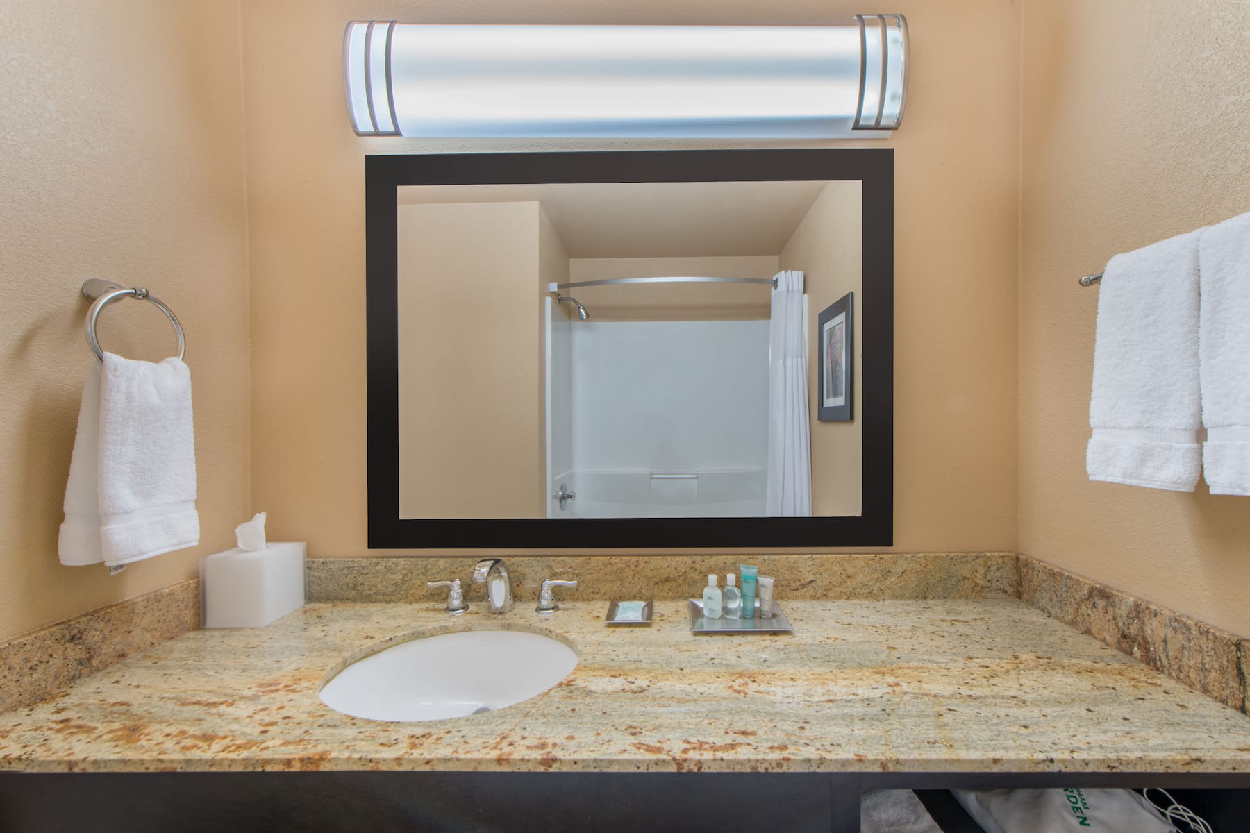 Guest room bath at the Wyndham Garden Oklahoma City Conference Ctr/Airpt/Bricktown in Oklahoma City, Oklahoma