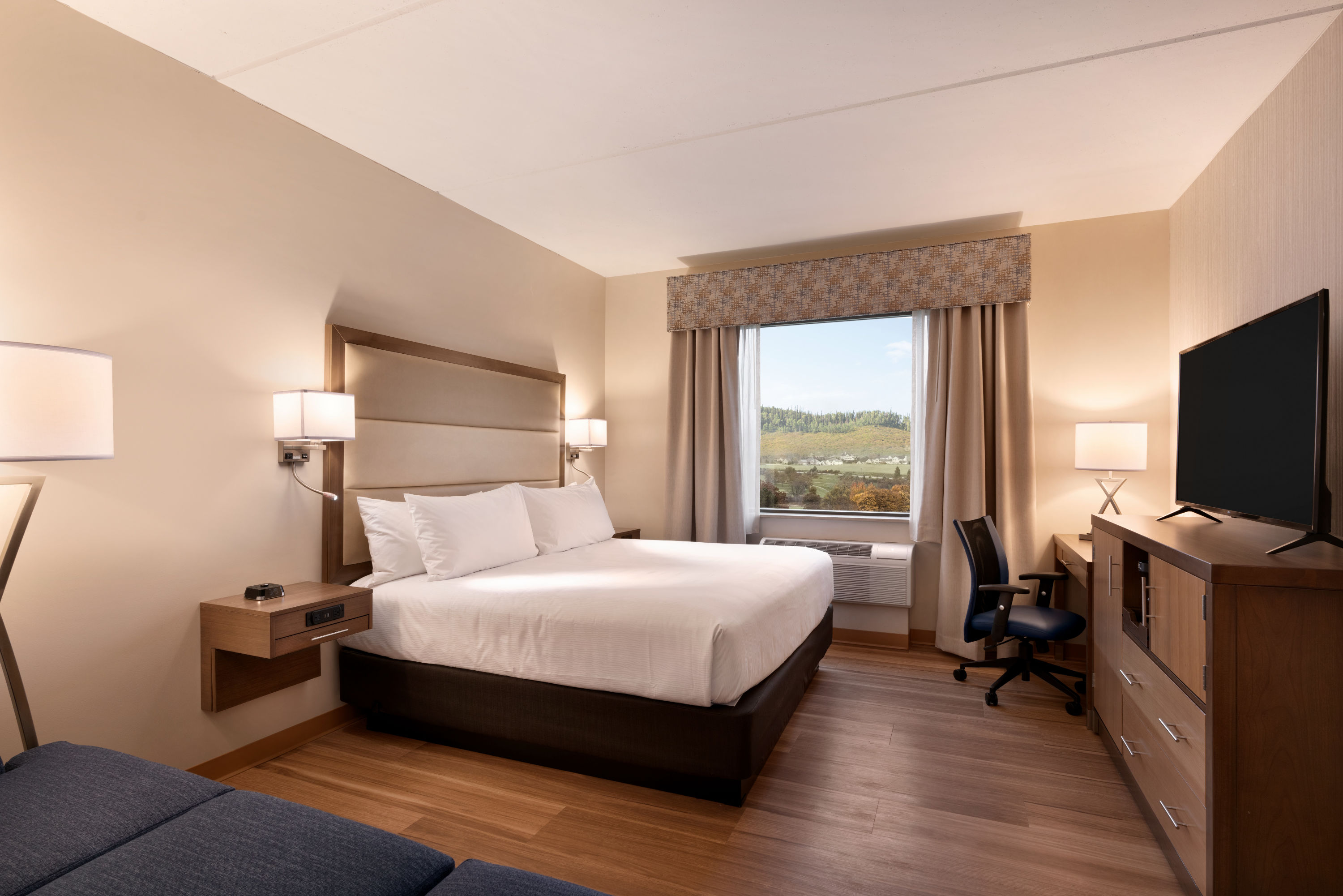 King bed guest room at the Wyndham Garden State College in Boalsburg, Pennsylvania