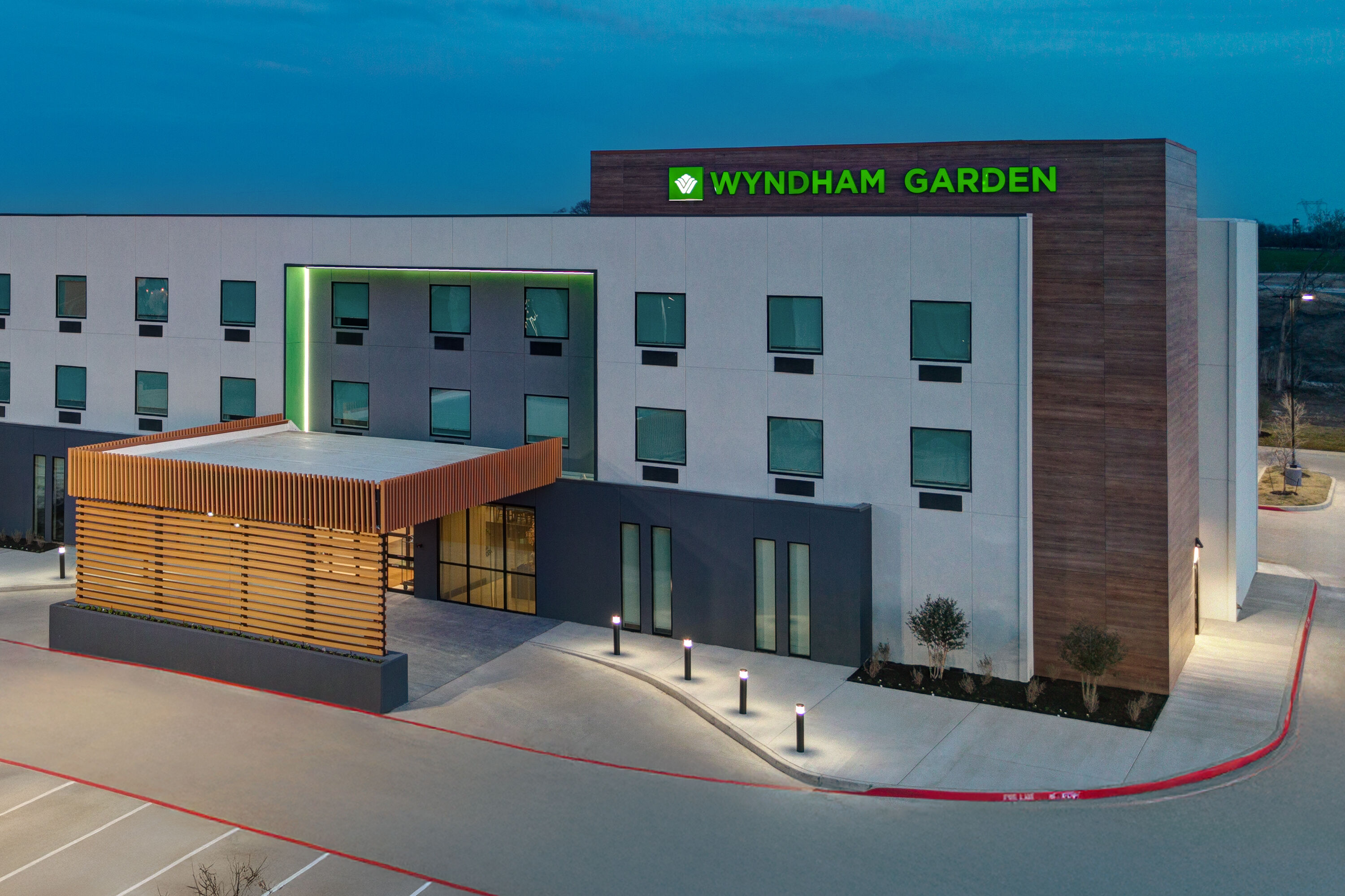 Exterior Dusk Image of Wyndham Garden Anna hotel in Anna, Texas