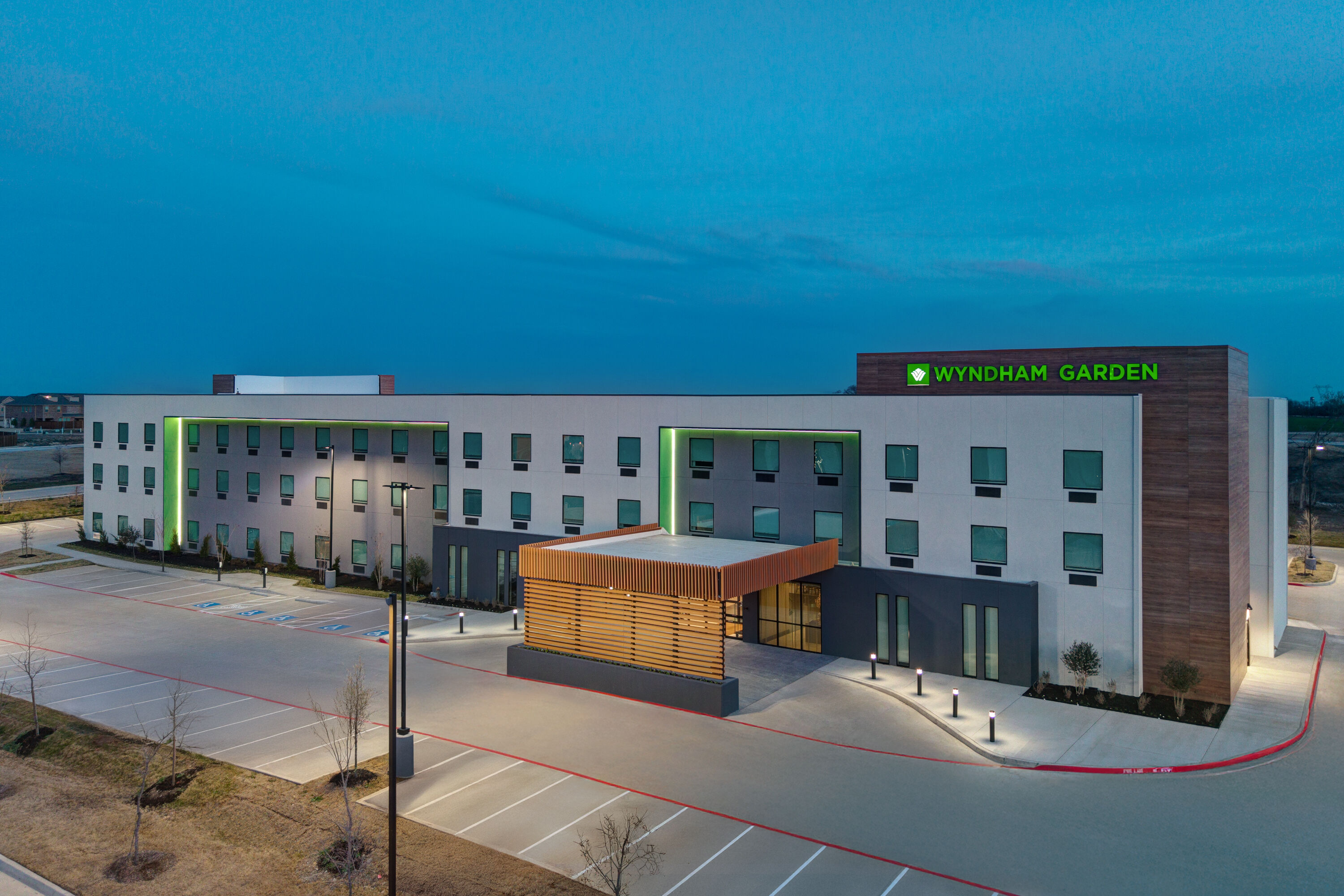 Exterior Dusk Image of Wyndham Garden Anna hotel in Anna, Texas