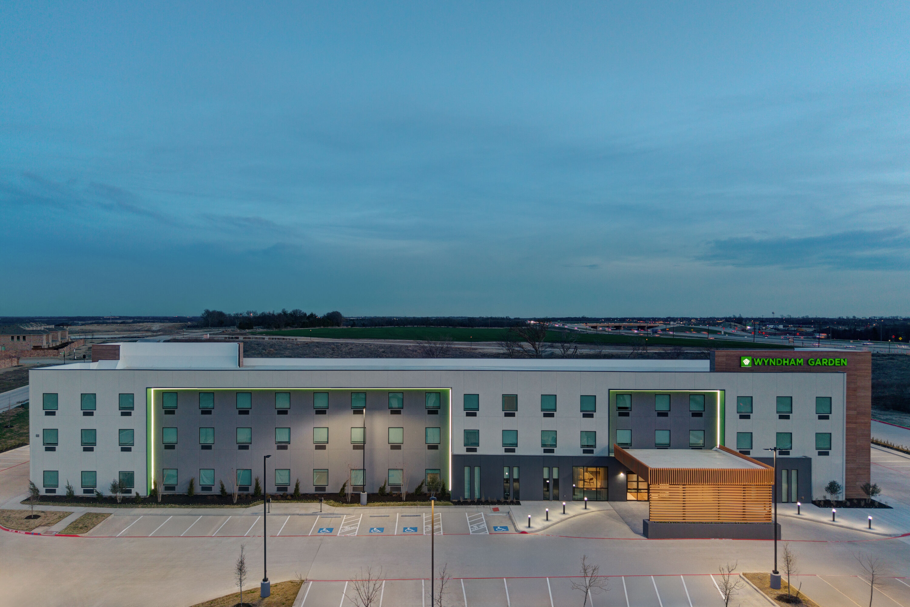 Exterior Dusk Image of Wyndham Garden Anna hotel in Anna, Texas