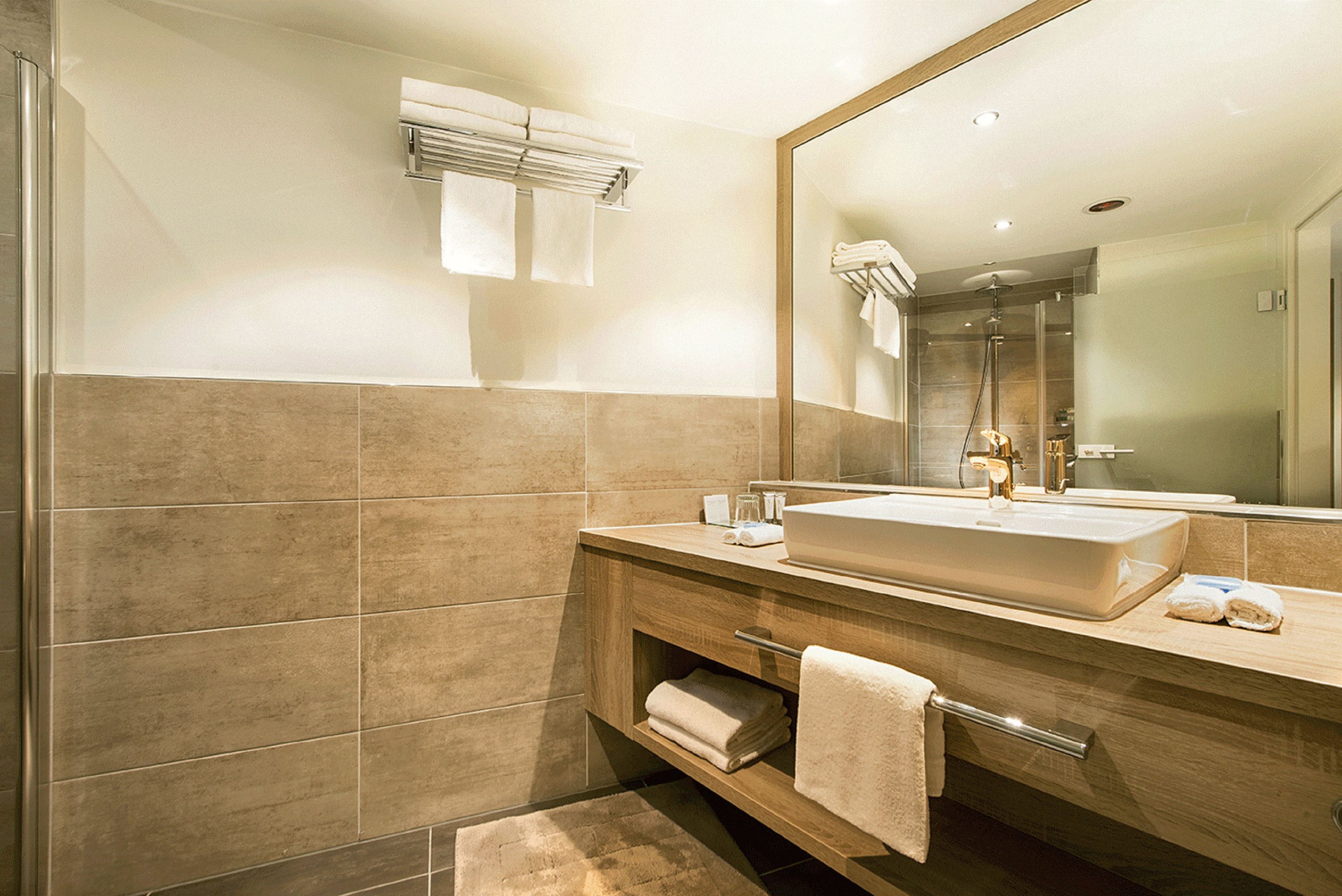 Guest room bath at the Wyndham Grand Salzburg Conference Centre in Salzburg, Other than US/Canada