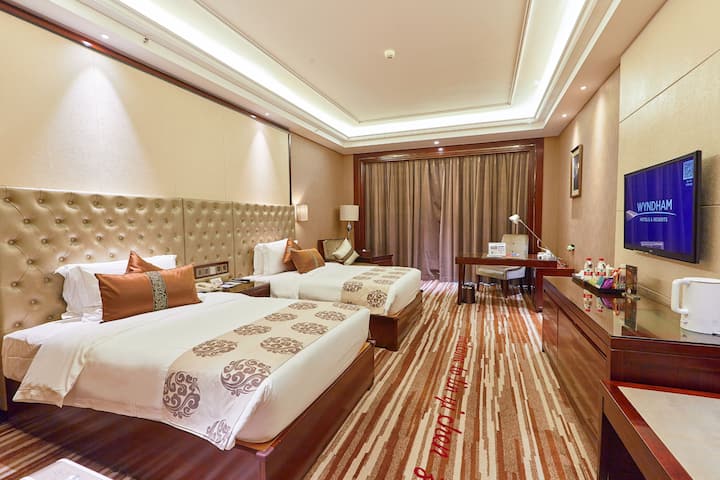 Guest room at the Wyndham Grand Plaza Royale Chenzhou in Chenzhou, Other than US/Canada