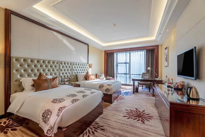 Guest room at the Wyndham Grand Plaza Royale Chenzhou in Chenzhou, Other than US/Canada