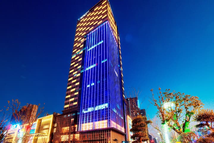 Exterior Dusk Image of Wyndham Grand Plaza Royale Powerlong Fuyang hotel in Fuyang, Other than US/Canada