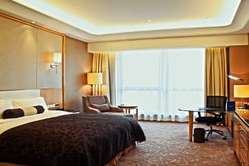 Guest room at the Wyndham Grand Plaza Royale Changsheng Jiangyin in Jiangyin, Other than US/Canada