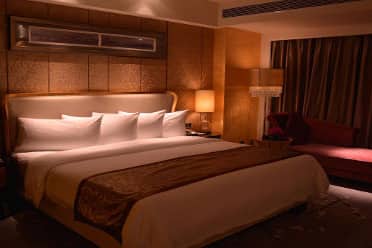 Guest room at the Wyndham Grand Plaza Royale Colorful Yunnan Kunming in Kunming, Other than US/Canada