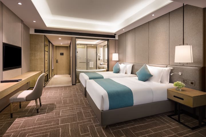 Guest room at the Wyndham Grand Maoming in Maoming, Other than US/Canada