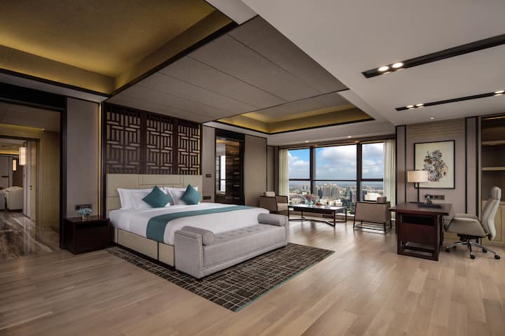 Guest room at the Wyndham Grand Maoming in Maoming, Other than US/Canada