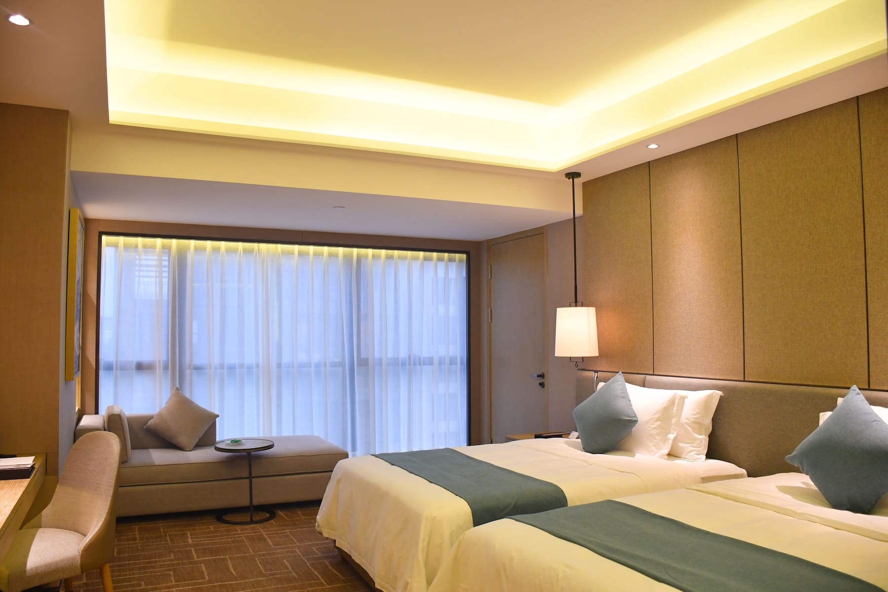 Guest room at the Wyndham Grand Maoming in Maoming, Other than US/Canada