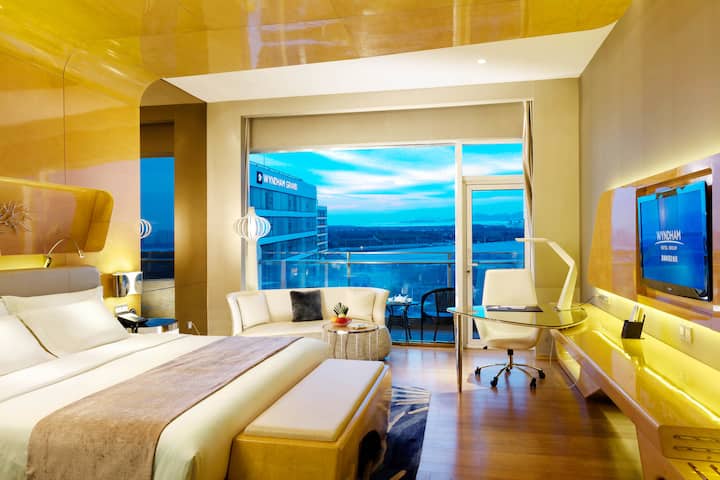 Guest room at the Wyndham Grand Qingdao in Qingdao, Other than US/Canada