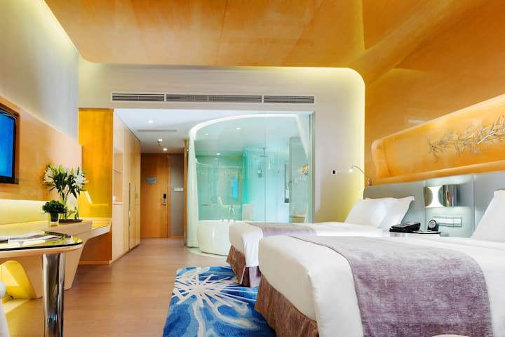 Guest room at the Wyndham Grand Qingdao in Qingdao, Other than US/Canada