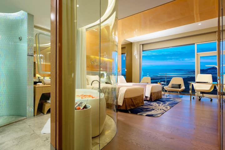 Guest room at the Wyndham Grand Qingdao in Qingdao, Other than US/Canada