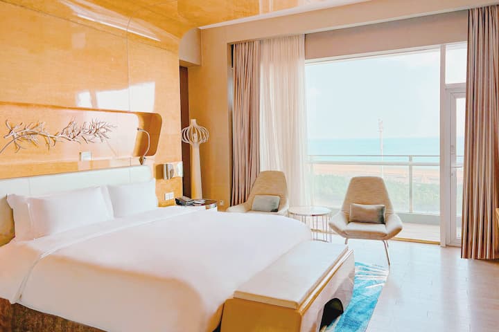 Guest room at the Wyndham Grand Qingdao in Qingdao, Other than US/Canada