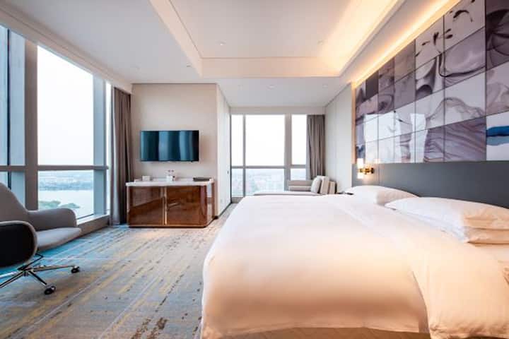 Guest room at the Wyndham Grand Suzhou Fenhu in Suzhou, Other than US/Canada