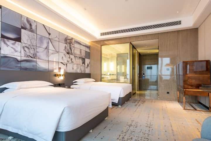 Guest room at the Wyndham Grand Suzhou Fenhu in Suzhou, Other than US/Canada