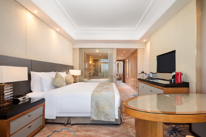 Guest room at the Wyndham Grand Xiamen Haicang in Xiamen, Other than US/Canada