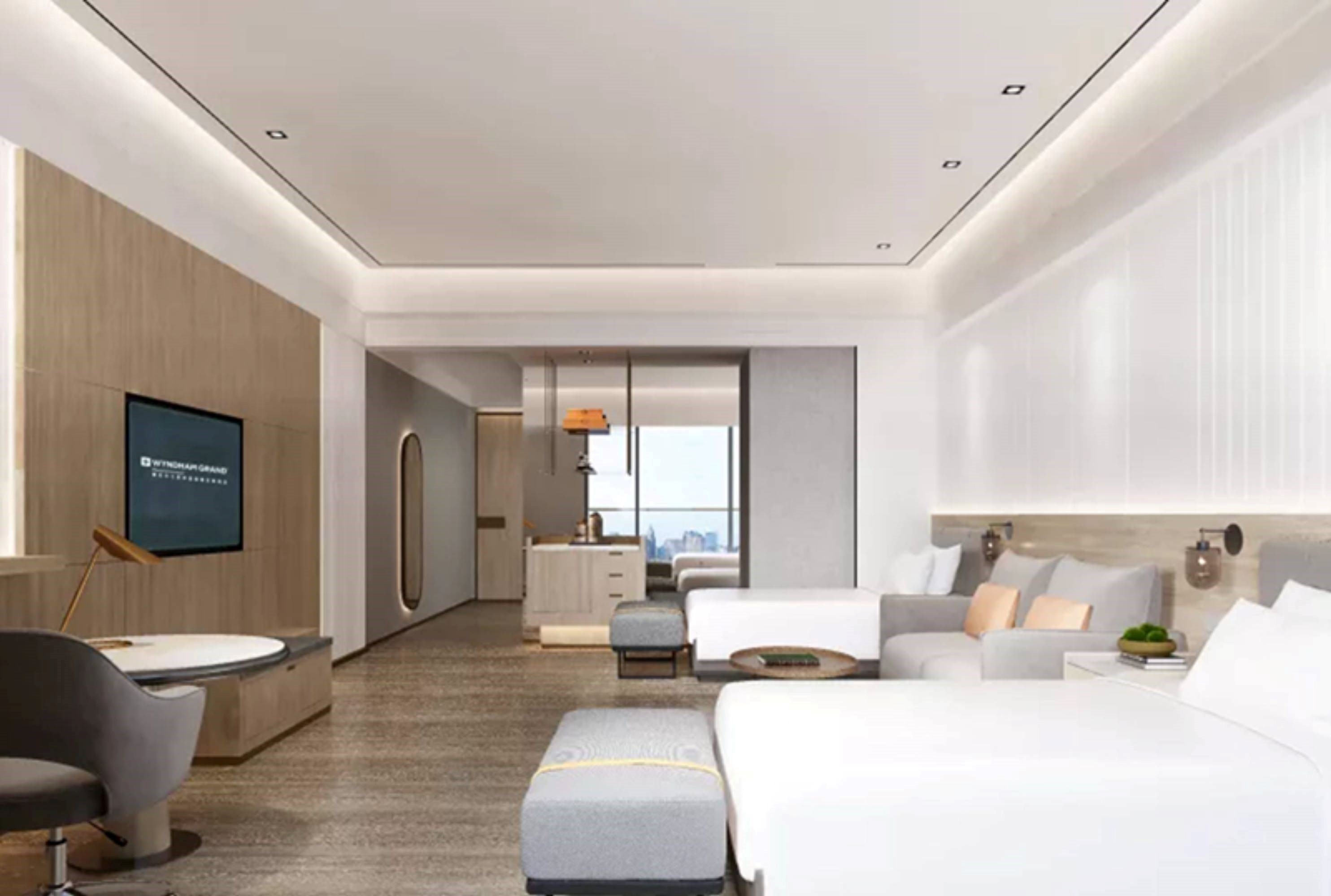 Guest room at the Wyndham Grand Zhaoqing Downtown in Zhaoqing, Other than US/Canada