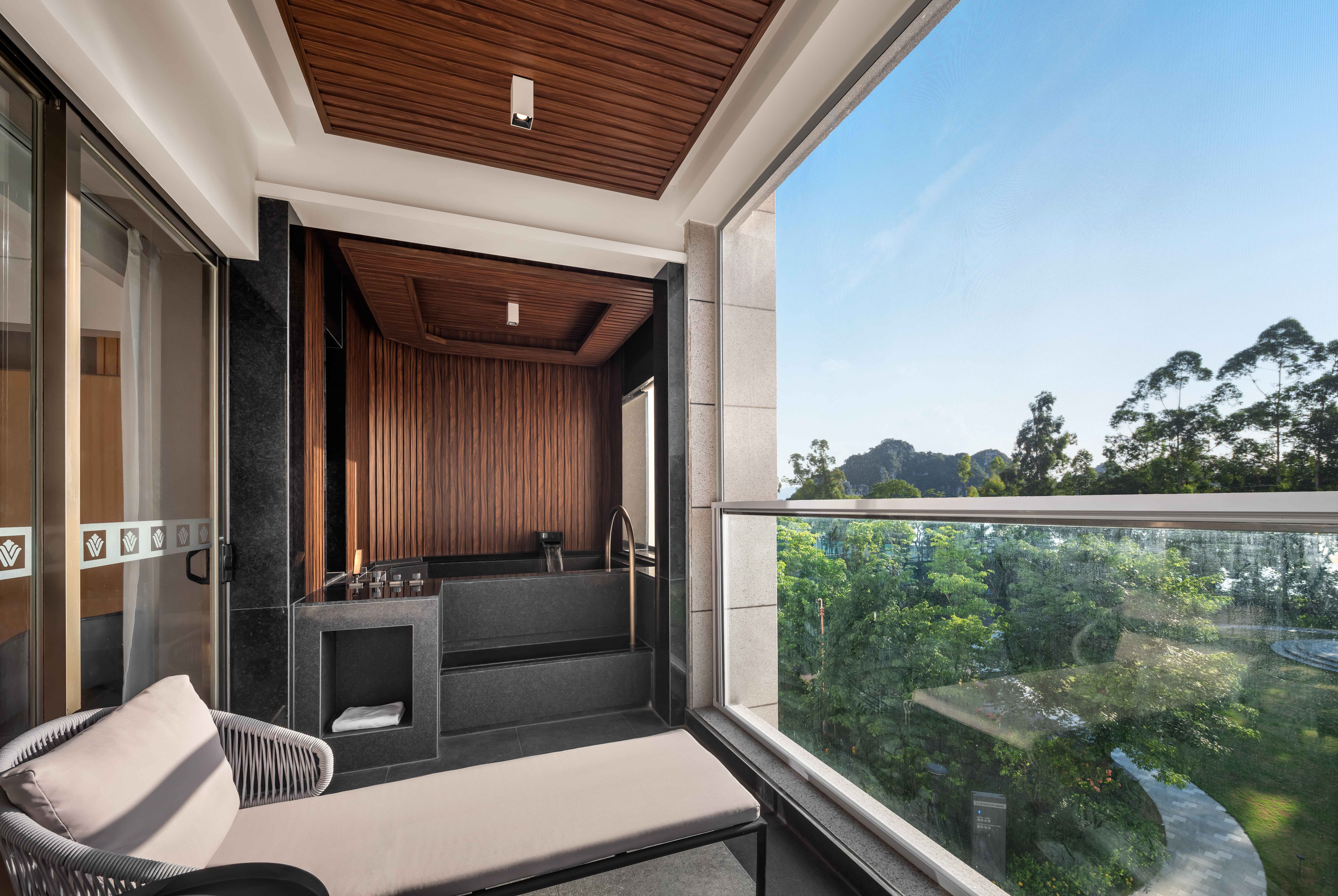 Guest room at the Wyndham Grand Zhaoqing Downtown in Zhaoqing, Other than US/Canada