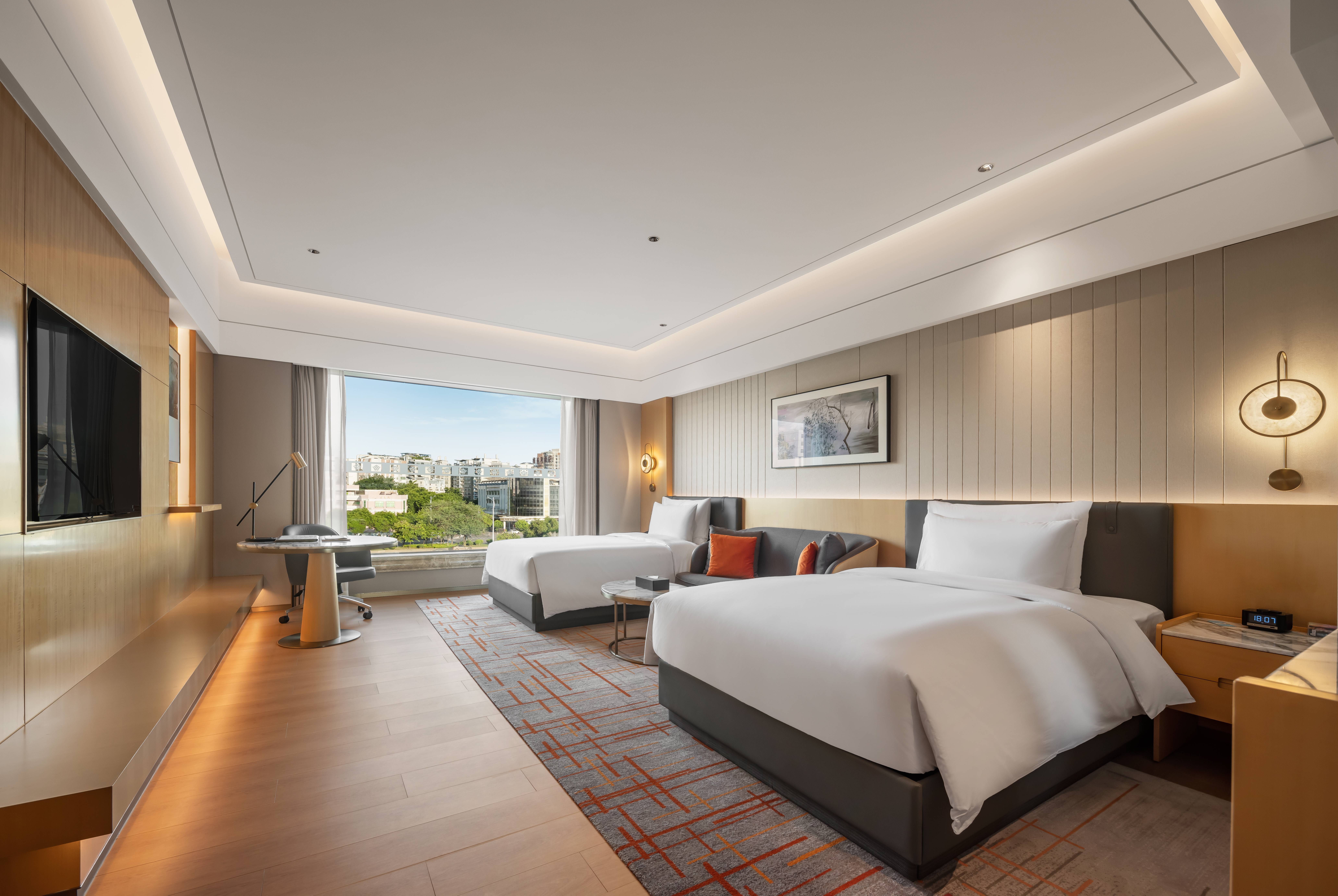 Guest room at the Wyndham Grand Zhaoqing Downtown in Zhaoqing, Other than US/Canada