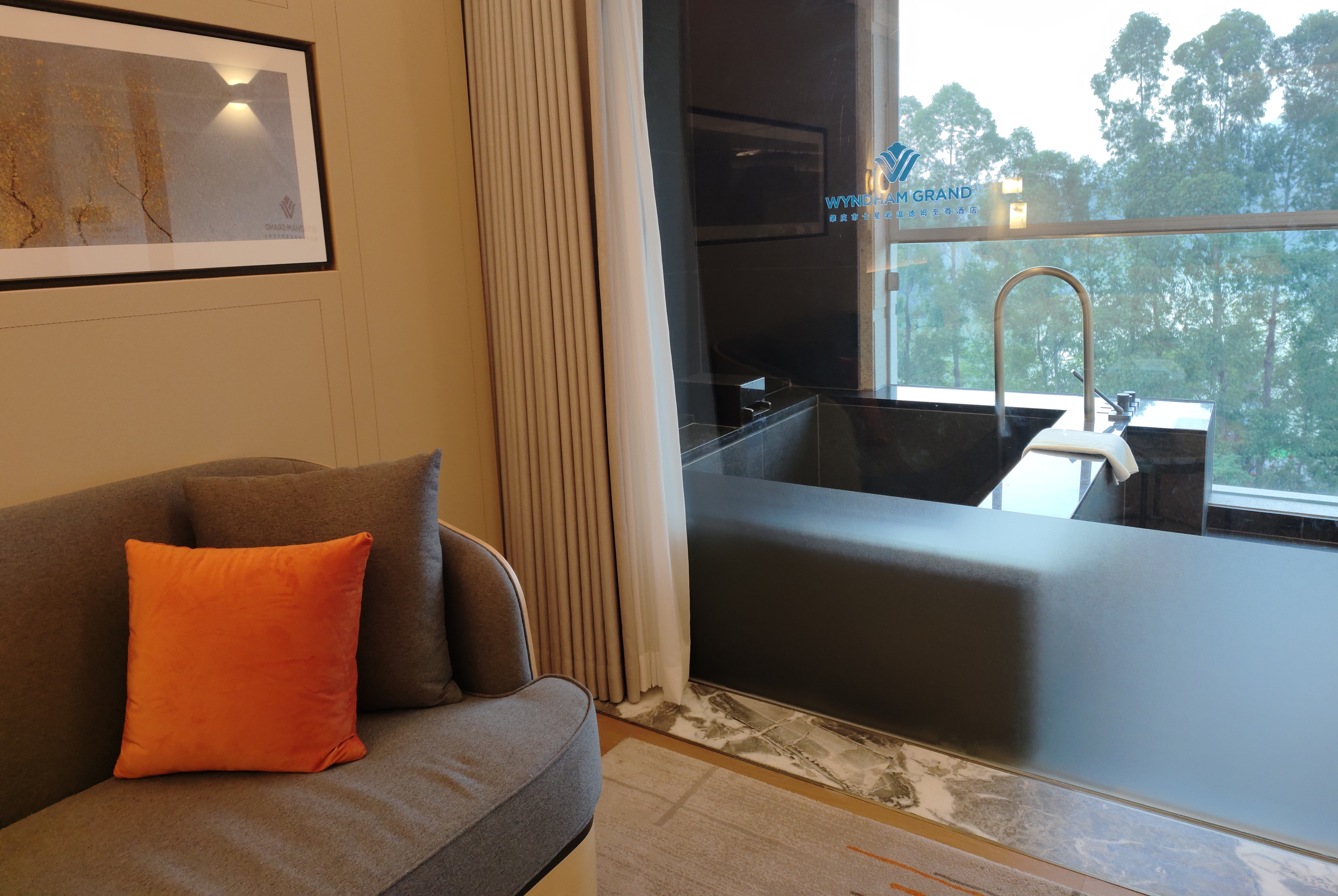 Guest room at the Wyndham Grand Zhaoqing Downtown in Zhaoqing, Other than US/Canada