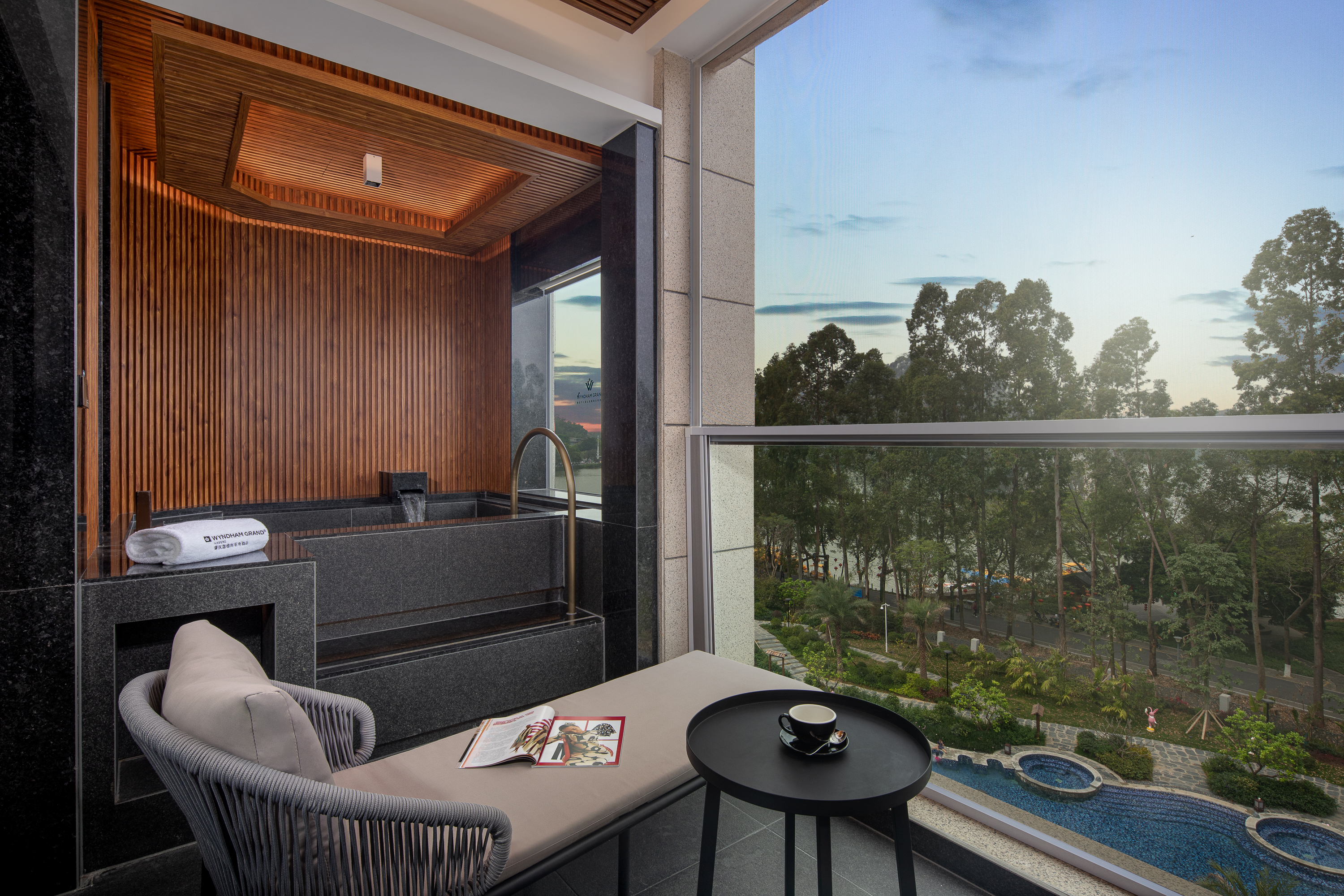 Guest room at the Wyndham Grand Zhaoqing Downtown in Zhaoqing, Other than US/Canada