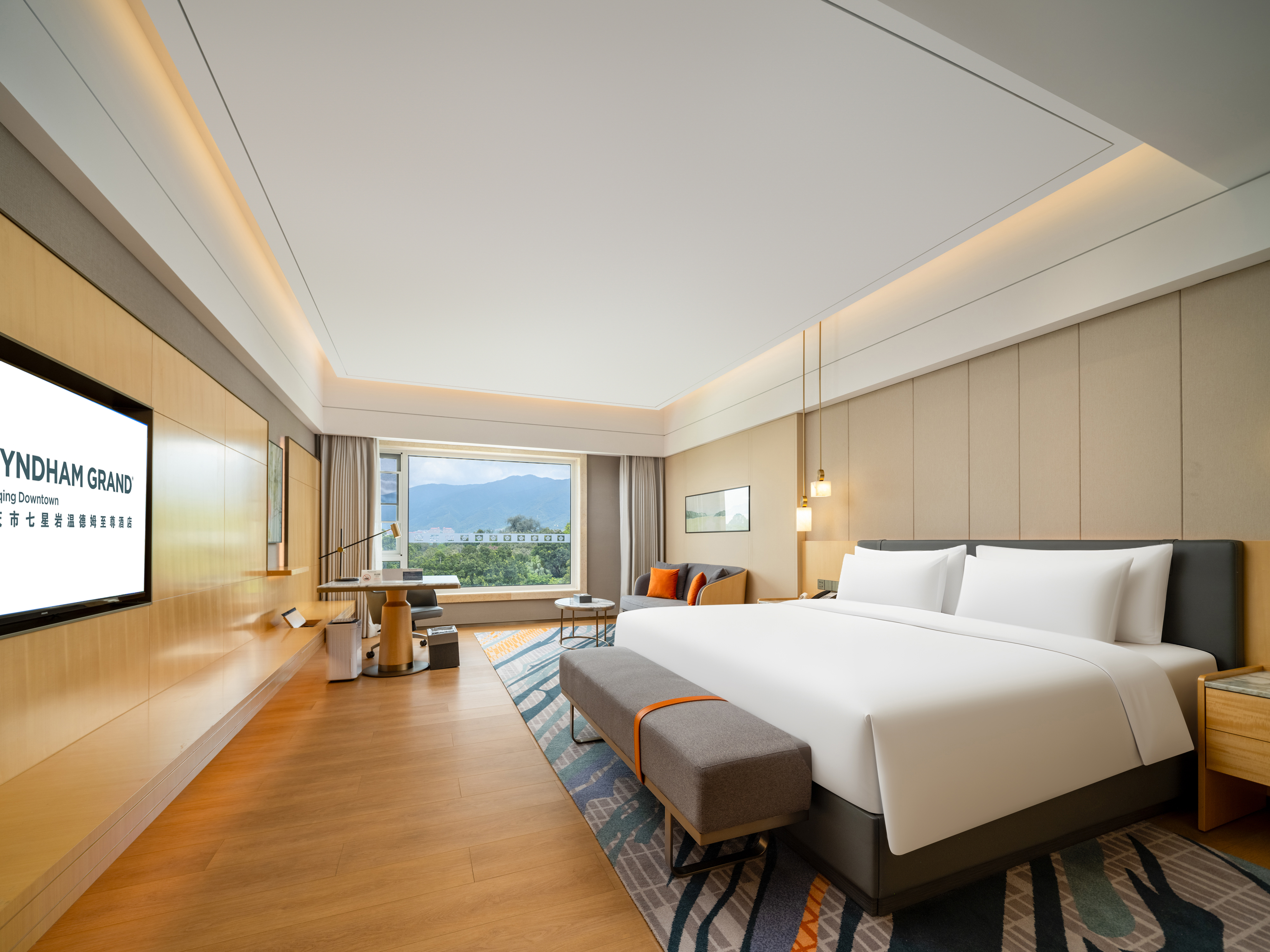 Guest room at the Wyndham Grand Zhaoqing Downtown in Zhaoqing, Other than US/Canada