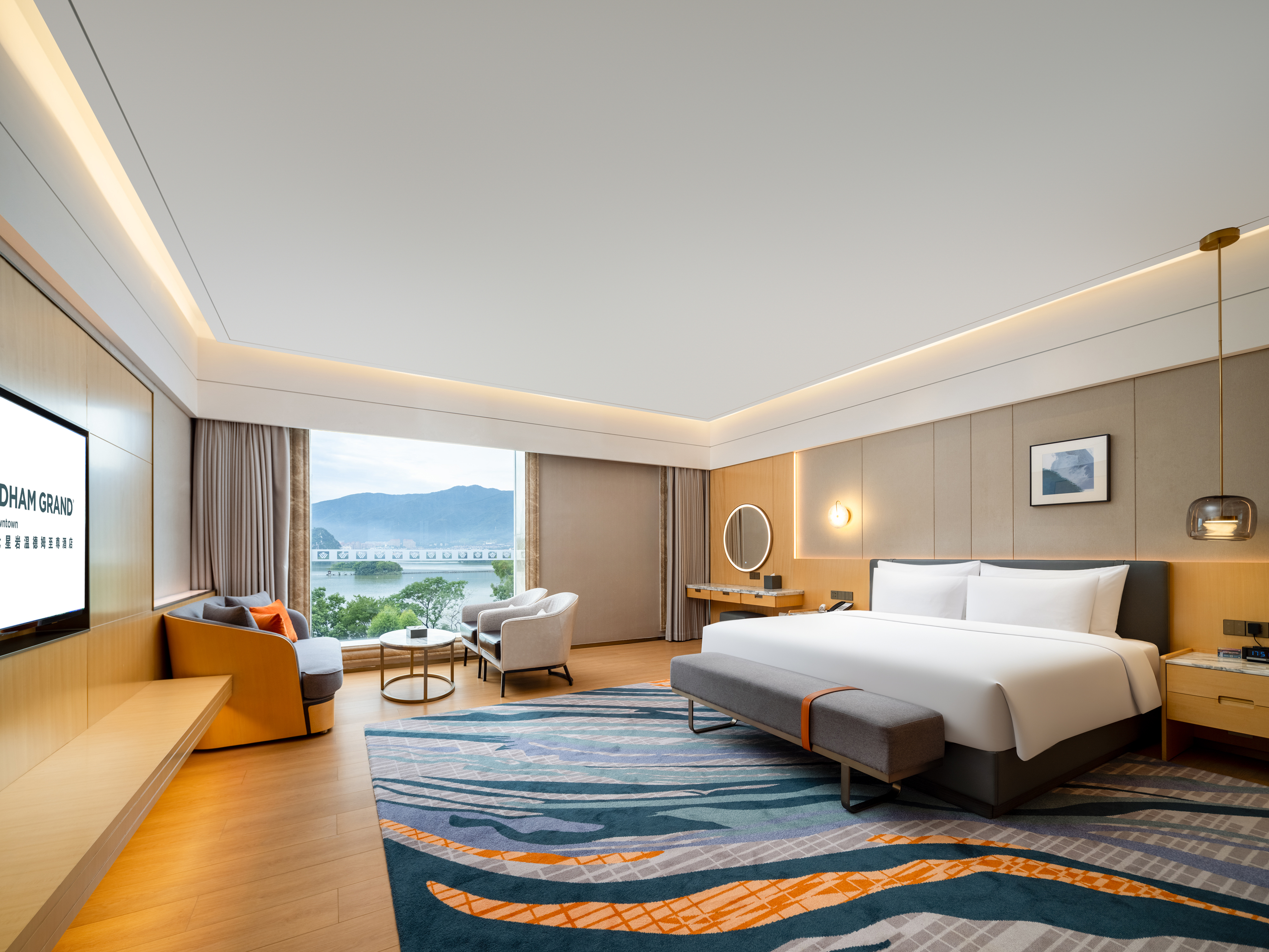 Guest room at the Wyndham Grand Zhaoqing Downtown in Zhaoqing, Other than US/Canada