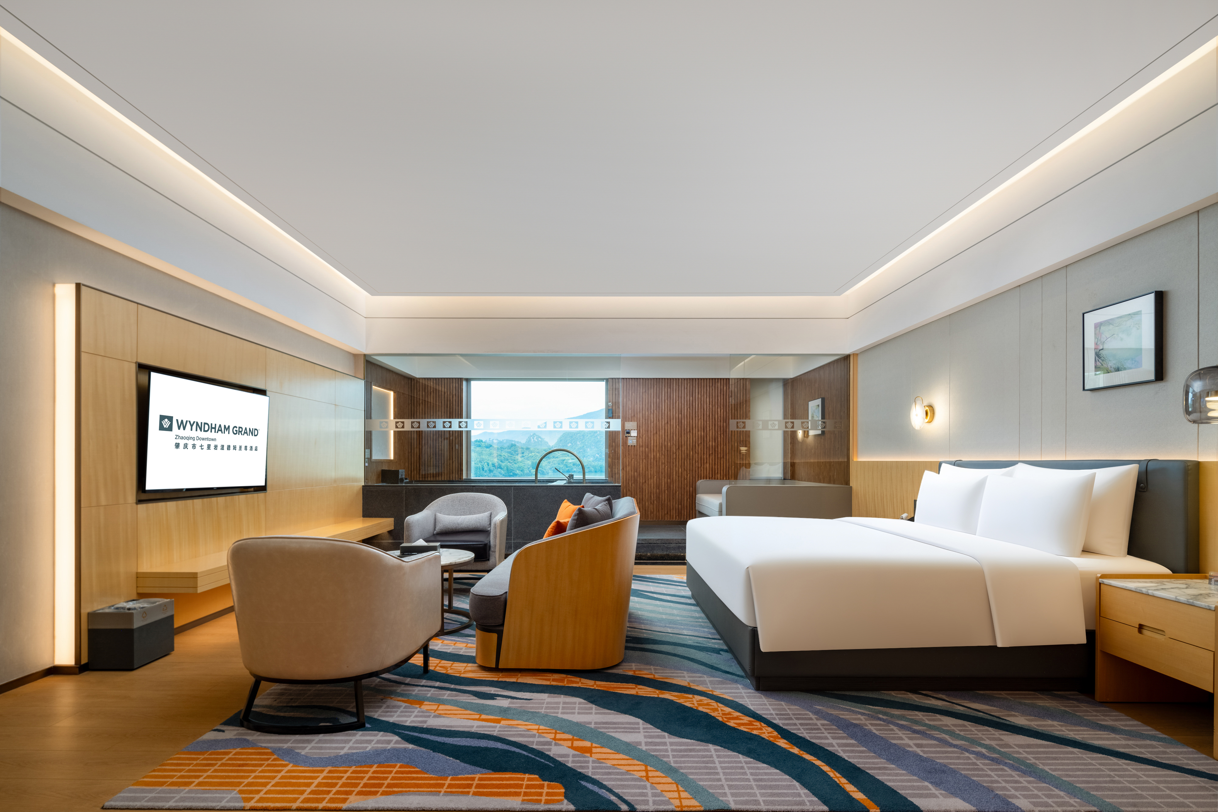 Guest room at the Wyndham Grand Zhaoqing Downtown in Zhaoqing, Other than US/Canada