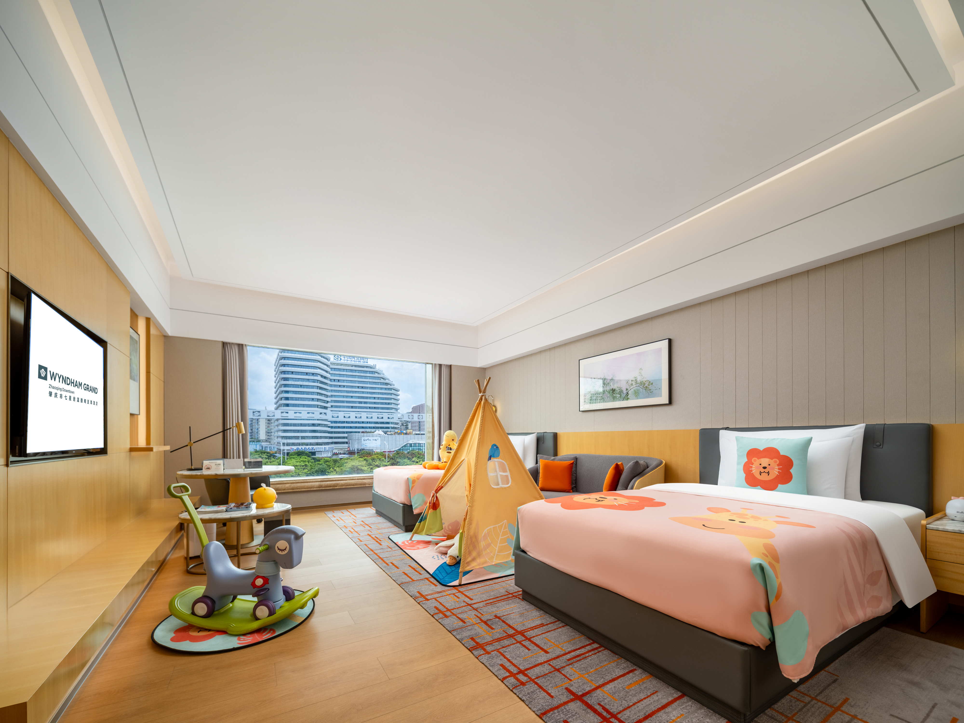 Guest room at the Wyndham Grand Zhaoqing Downtown in Zhaoqing, Other than US/Canada