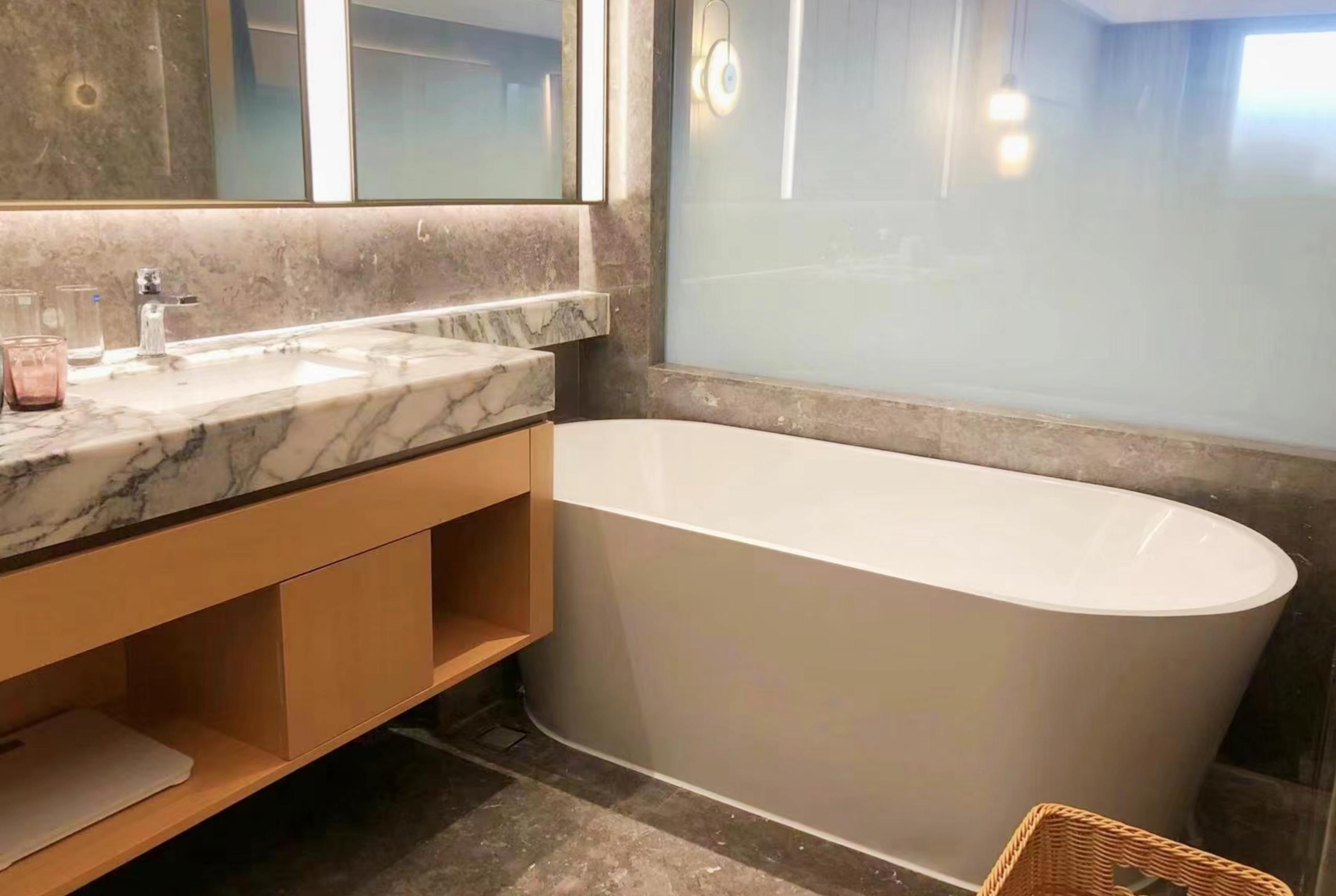 Guest room bath at the Wyndham Grand Zhaoqing Downtown in Zhaoqing, Other than US/Canada