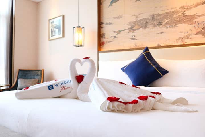 Guest room at the Wyndham Grand Plaza Royale Zhaotong in Zhaotong, Other than US/Canada