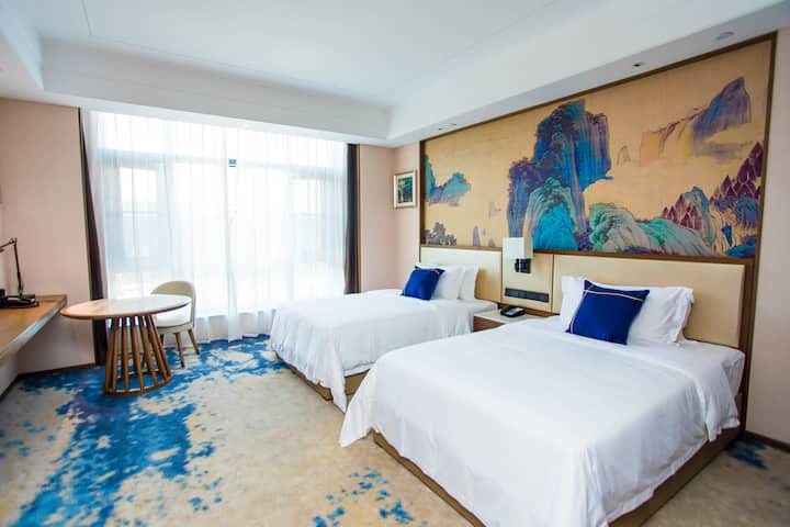 Guest room at the Wyndham Grand Plaza Royale Zhaotong in Zhaotong, Other than US/Canada