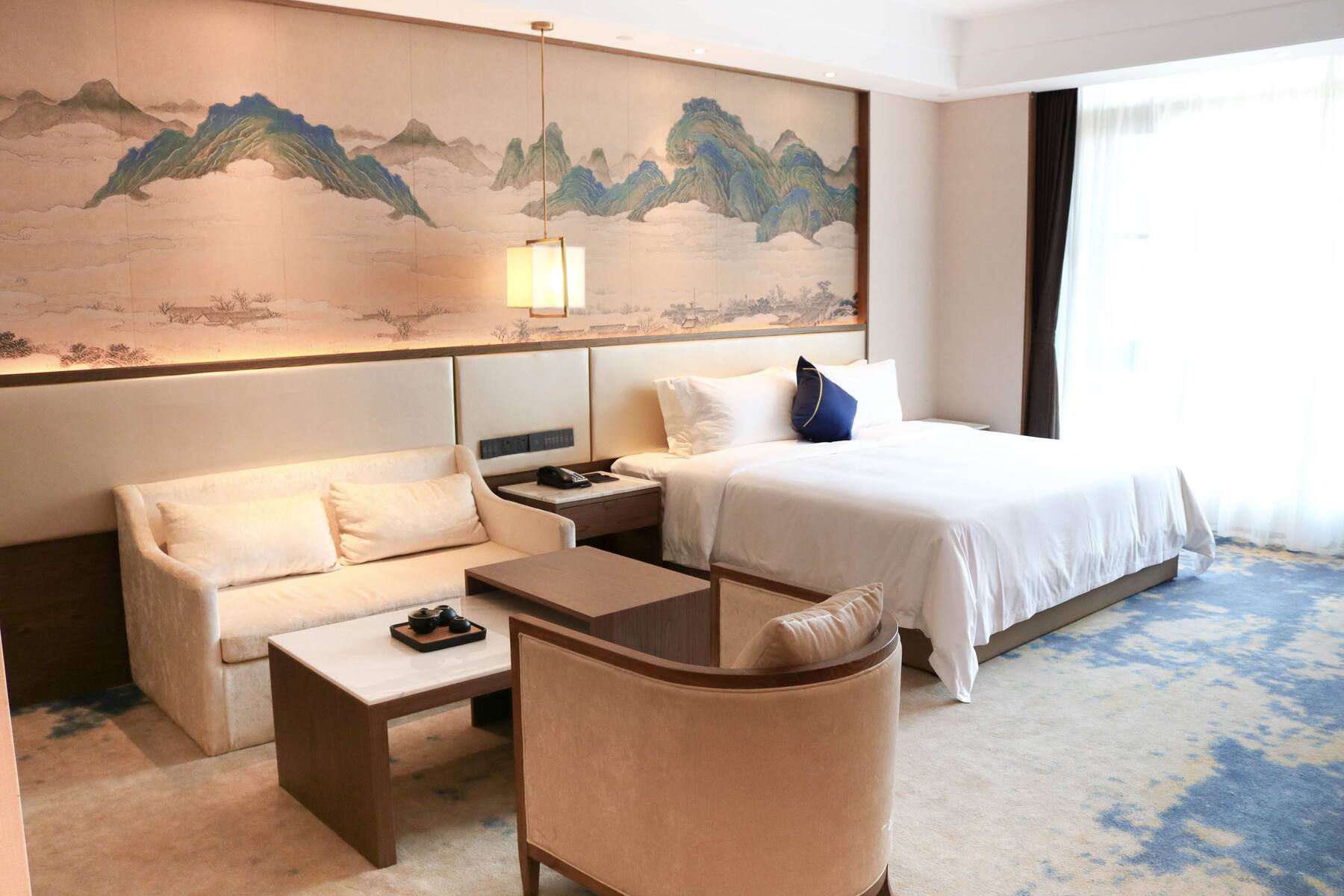 Guest room at the Wyndham Grand Plaza Royale Zhaotong in Zhaotong, Other than US/Canada