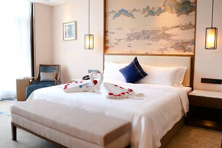 Guest room at the Wyndham Grand Plaza Royale Zhaotong in Zhaotong, Other than US/Canada