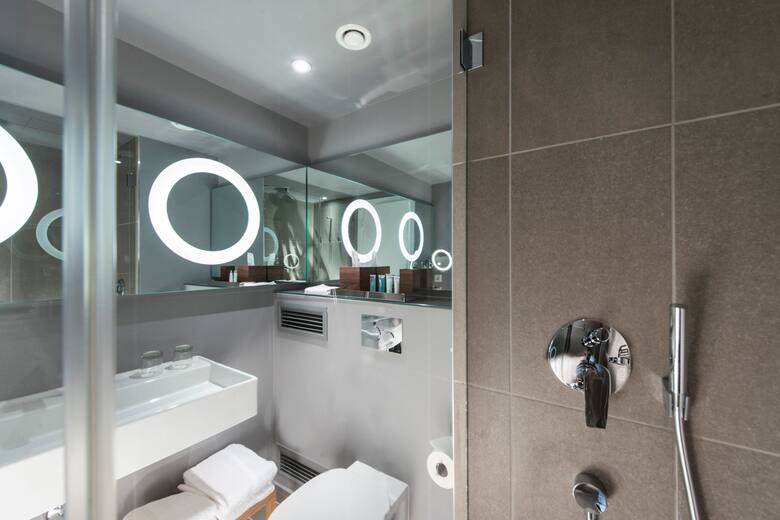 Guest room at the Wyndham Grand Frankfurt in Frankfurt am Main, Other than US/Canada